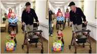 Funny video captures baby using a walker & doing exactly what his grandpa does
