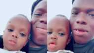 Shatta Bandle poses with cute son in new video,netizens say "No DNA needed"