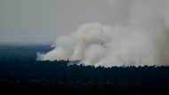 Blasts ring out as fires rage in Berlin forest