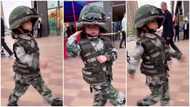 Smart kid in military uniform marches gallantly like soldier in parade, salutes accurately, video goes viral