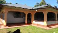 Lady who grew up in mud house builds beautiful house for parents
