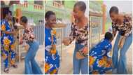 Emotional video shows young lady surprise woman with Ghc1k days after breaking a crate of eggs in her shop