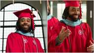 Single Black father graduates with masters degree while working 3 jobs to care for his son