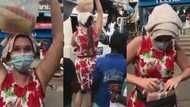 Krom ayeshi: Video of German lady hawking drinks on the street of Accra pops up