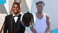 Abraham Attah's new dreadlocks almost challenge Bob Marley's , covering his entire face