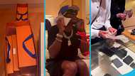 Shatta Wale flaunts $100 notes, sings Whitney Houston's I Will Always Love You in Louis Vuitton store, video