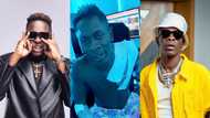 Shatta Wale shows massive love to Medikal as he tattooes rapper's name on his body
