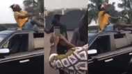 Money Talks: Emmanuel Adebayor, Funny Face, others, 'chill' on luxury car in video