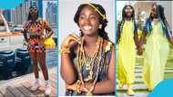Okyeame Kwame’s daughter looks tall and graceful in a kente outfit for her 14th birthday photoshoot