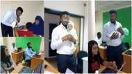 Cute photos capture Nigerian teacher carrying his student's baby as mum gets busy with classwork, many react