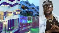 Rapper Nhyiraba Kojo shows he is richer than Shatta Wale as he opens gates of his gigantic mansion with big pool after in new video