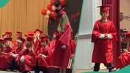 Young boy in his graduation gown tells crowd he wants to be like his father when he grows up