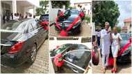 Lady surprises her husband with a new car on their 7th wedding anniversary, photos spark reactions