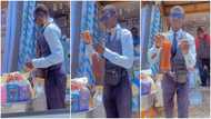 Hardworking man in waistcoat captured selling 'asaana' in video, peeps love his decent look