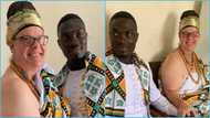 Ghanaian man delights as he weds elderly Obroni lover, flaunts marriage certificate, peeps react