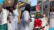 Ghanaian woman gets emotional as sons gift her new car in adorable video: "She raised us as a single mom"