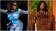 Sista Afia glows in star-studded silver gown, flaunts tattoo as part of dress is cut out around the right hip