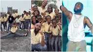 Davido rocks uniform with kids as they dance to Feel in video: "A memory they will never forget"