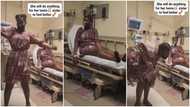 Lady wears matching dress as hospitalized twin sister & dances to make her smile in emotional video