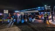 Dutch bus out asylum-seekers at crisis-hit centre