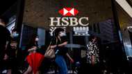 HSBC H1 pre-tax profit falls, says to pay quarterly dividends