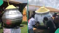 Food seller from Ghana buried inside fantasy coffin that looks like iron pot after she passed on