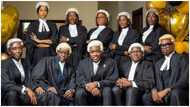 Kennedy Osei poses in beautiful lawyer's gown with his colleagues in the bar