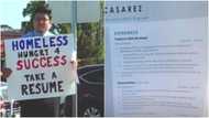 A homeless man who took to the streets to display a placard telling people to take his resume gets many job offers