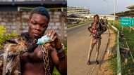 AY Poyoo lands in Nigeria, takes picture at Lagos airport with his goat