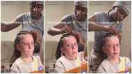 Viral video of little white girl holding back tears as she gets hair braided sparks reactions