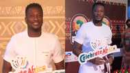 Asamoah Gyan dazzles in white kaftan at the 2021 Afcon draw red carpet