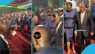 President Mahama and Akufo-Addo shake hands at the ECOWAS 50th anniversary launch