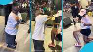 Shatta Bandle sprays lady with several GH¢50 notes in video