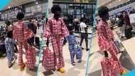 Ghanaian designer Fashion GodD and little boy slay in Ghana Must Go outfits, walk around the airport in video