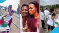 Shatta Wale's ex-fiancée Michy spotted selling fruit juice by the roadside, hides her face