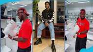 King promise storms shop, attempts to buy huge Balenciaga boots