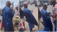 "He can be beaten": Nana Addo Lookalike Spotted buying coconut; Video Sparks Funny Reactions