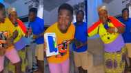 Ghanaian twins gift mom new watch & smartphone; her reaction tears people up online