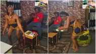 Pretty Nigerian female herbalist whines waist sweetly before her man as she serves him food, video causes stir