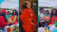 Jackie Appiah hands out food items and souvenirs to reward her community members at her birthday party