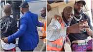 Davido invites airport staff into his jet, takes photo with him moments after bodyguard pushed him away