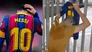 Tears as Barcelona fan parks outside Camp Nou, filmed crying while holding Lionel Messi jersey
