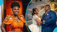 Sam George's little brother's wife fascinates Ghanaians with her magnificent kente gown designed with a cape