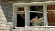 Blood and fears as Russian missile hits flats in east Ukraine city