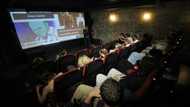Ukraine's reopening cinemas offer refuge from reality -- and air raids