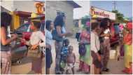 Lady begs for GH₵0.92 from girl hawking on street, rewards her, follows kid home & pays mother's rent in clip