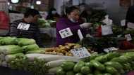 Asian markets mixed ahead of US inflation data, Fed decision