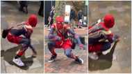 Ghanaian man in Spiderman costumes displays moves on the streets in the UK, hilarious video causes stir