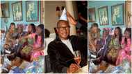 “Family raised in love”: Femi Otedola’s children cut his 61st birthday cake with his 91-year-old mum