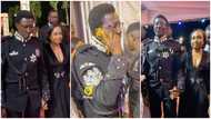 24 VGMA: Freedom Jacob Caesar flaunts gold-plated iPhone on the red carpet, wears matching black suits with wife Ruby Bediako